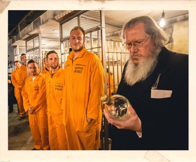 The Warden character at Alcotraz - key performer in this immersive prison-themed cocktail bar experience for interactive entertainment